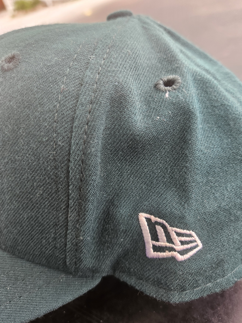 New Era Men’s Teal Baseball Cap with White Logo